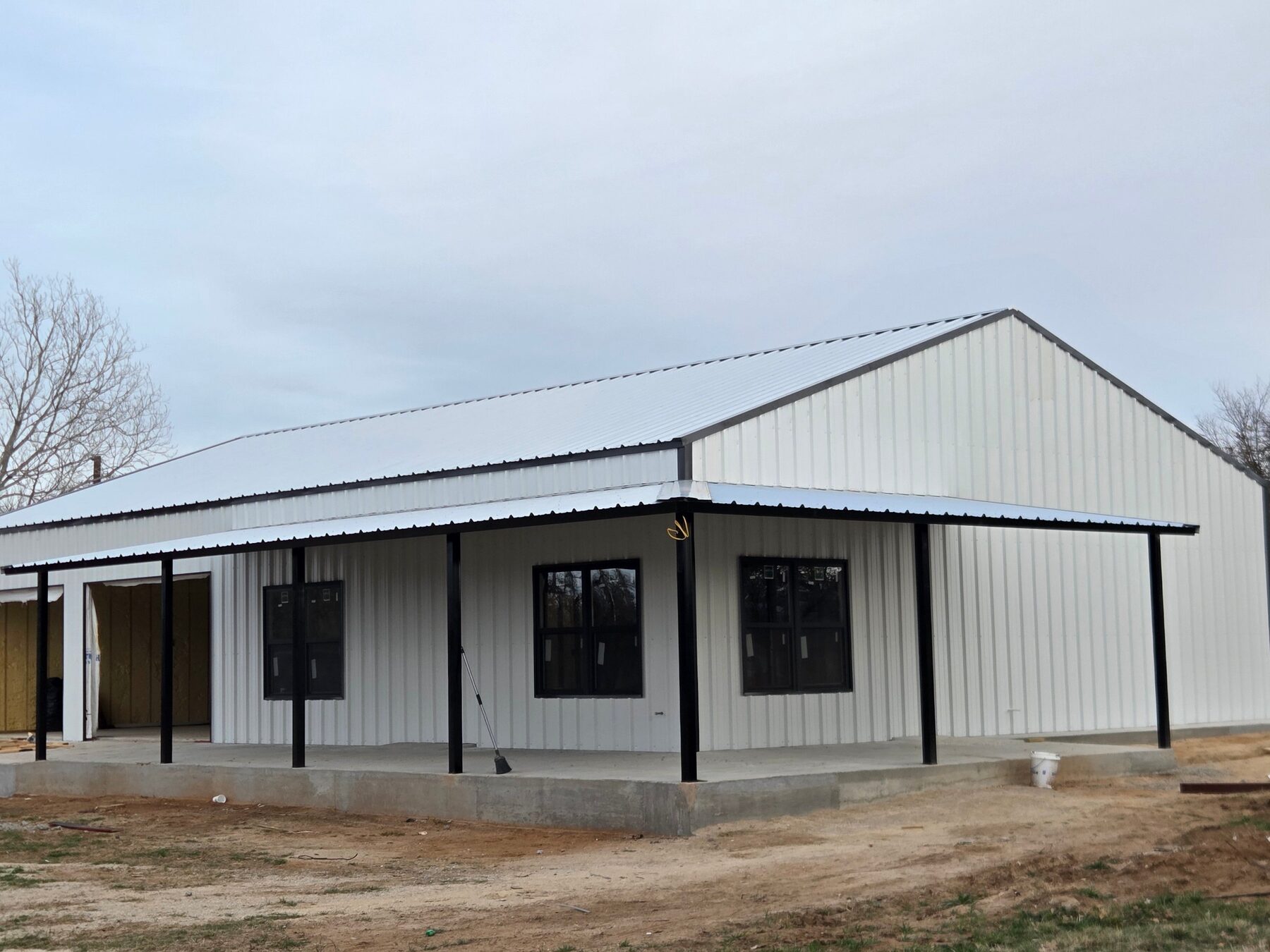 Custom home with a metal roof built by Absolute Building